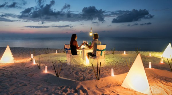 romantic candle light dinner on the beach